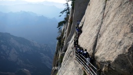 Entrance to the planks (that can be seen in the lower part of the picture), considered by many the most dangerous hiking trail in the world, Mount Hua, China